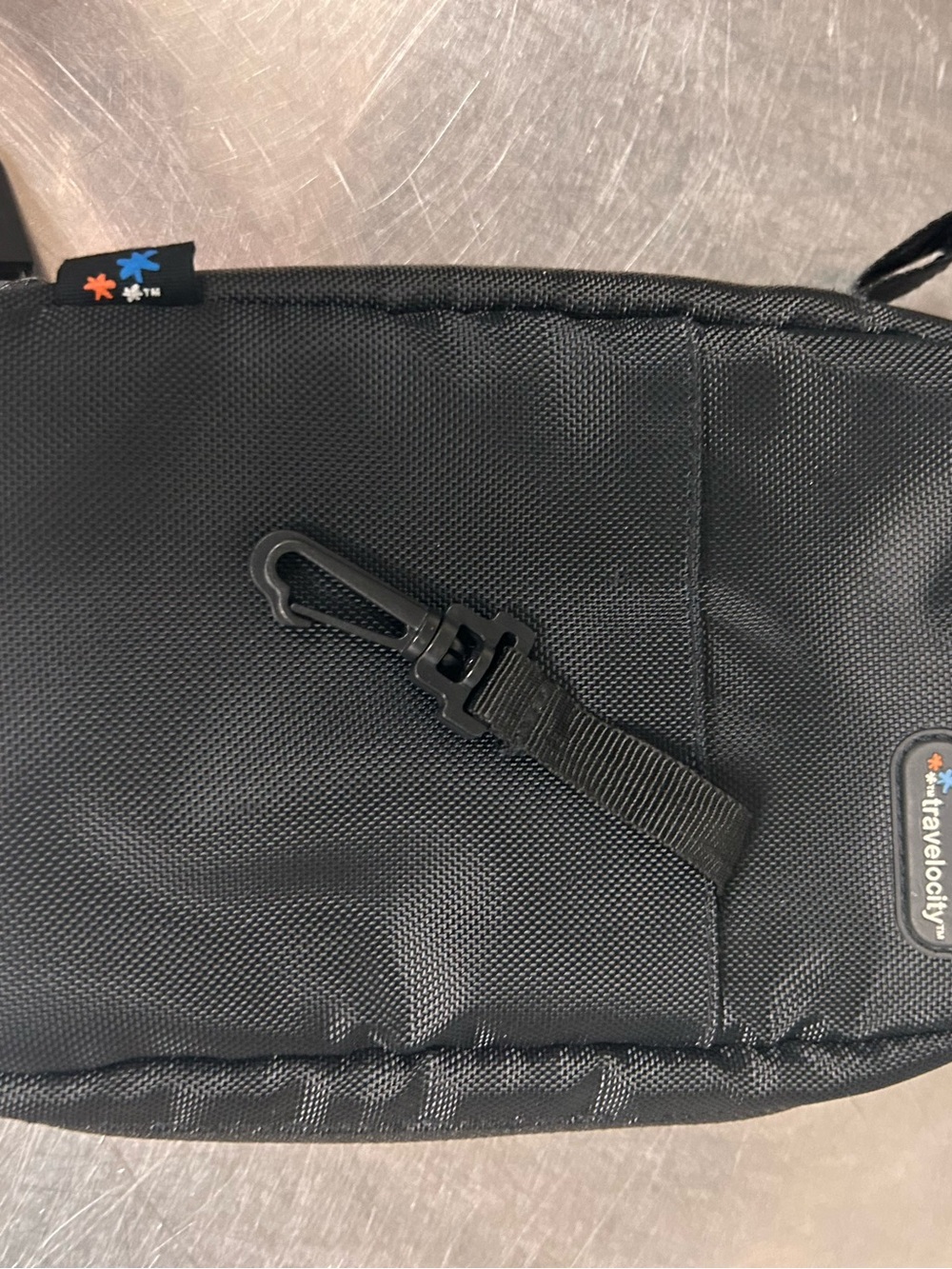 TraVelocity Black Men's Sling Belt Bag with Clip Detail